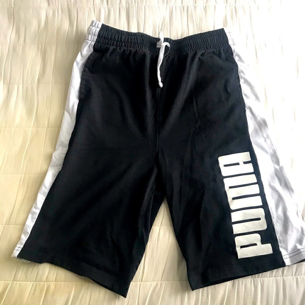 Puma boys athletic black and white shorts